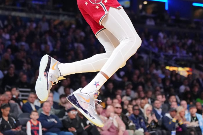 Kevin Durant's silver and orange Nike shoes worn in the 2024 NBA All-Star Game.